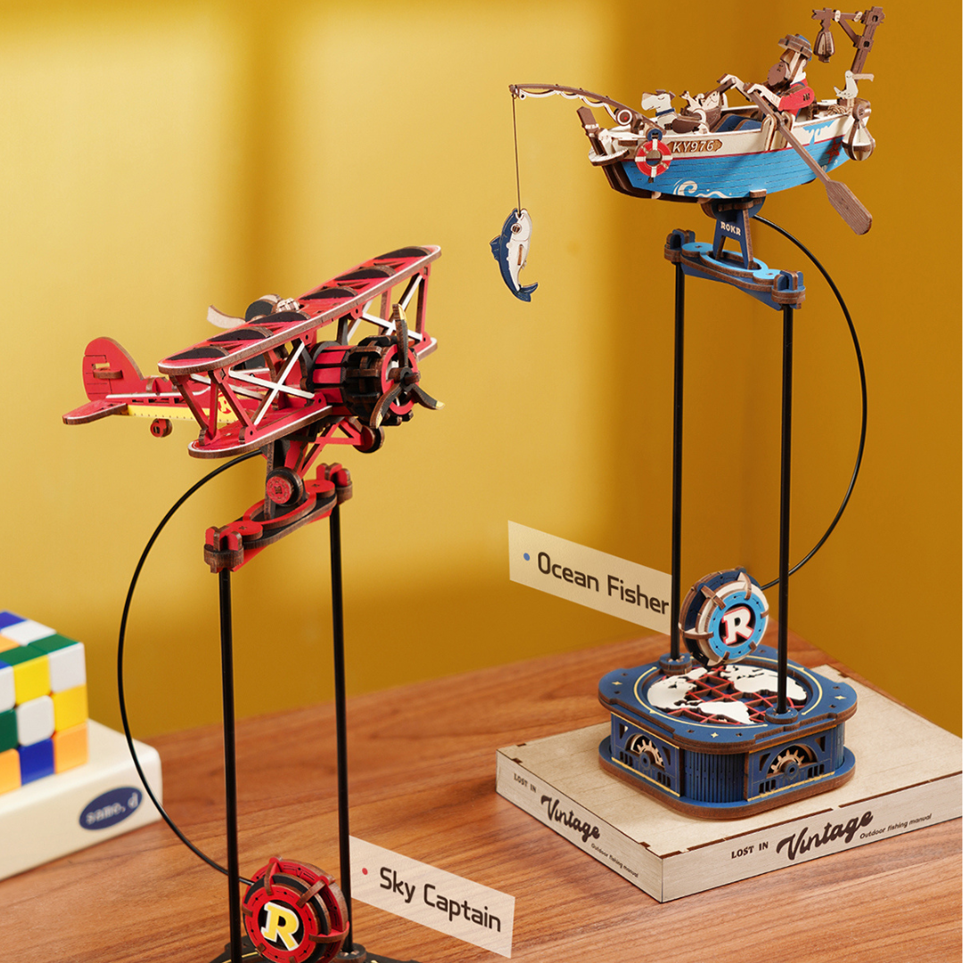 ROKR Gravity Swing Ocean Fisher and Sky Captain combination set on desk