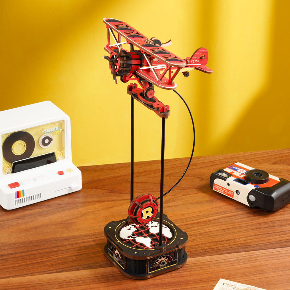 ROKR Sky Captain MCD01 pendulum balance toy biplane on tabletop stand