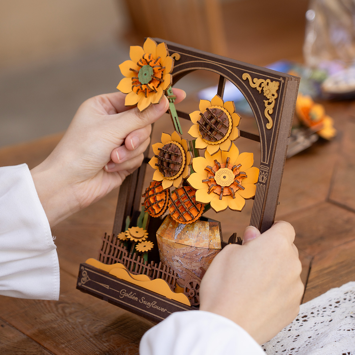Rowood Golden Sunflower TH002 hands assembling sunflower frame scene