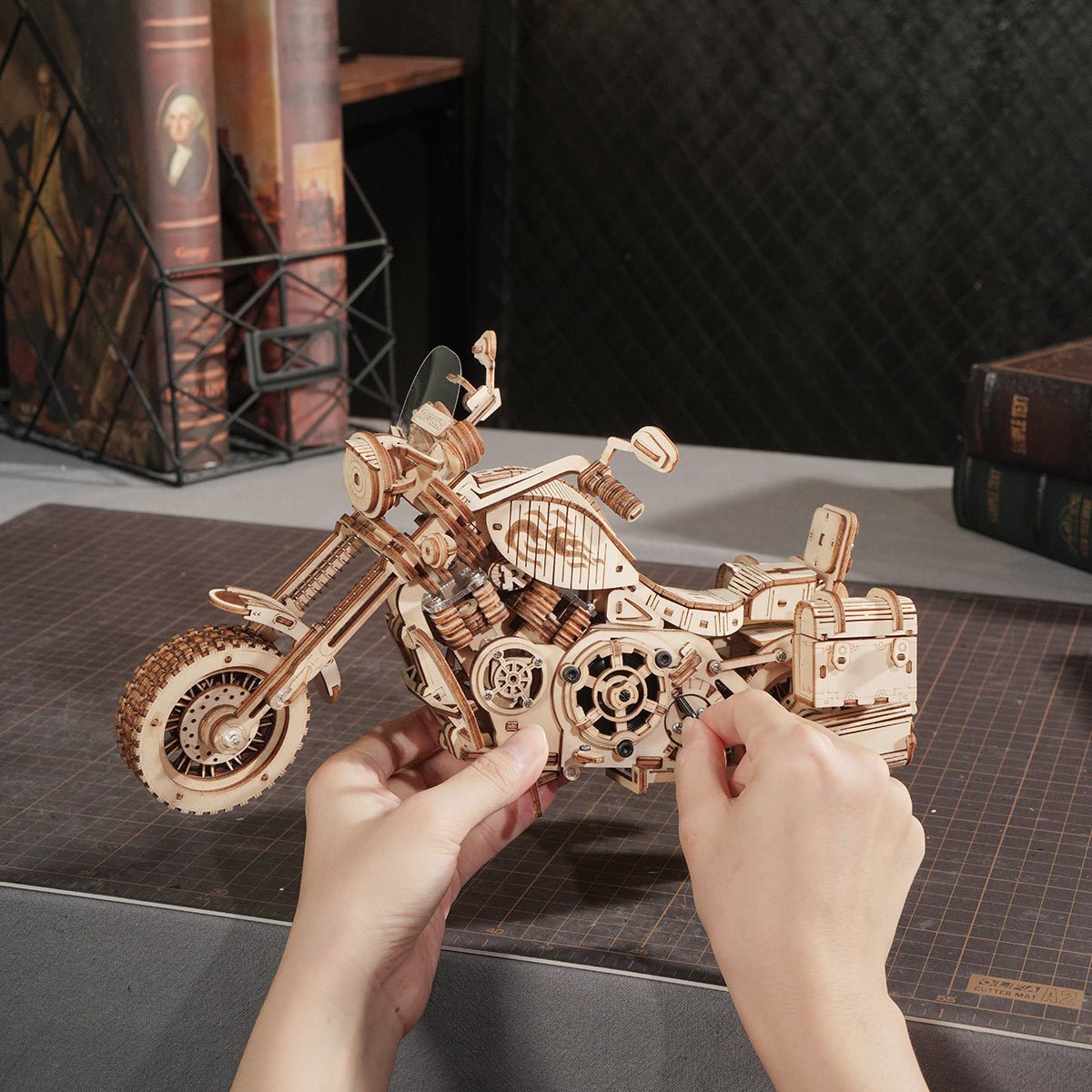 ROKR Cruiser Motorcycle LK504 hands adjusting motorcycle body details