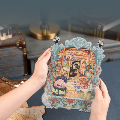 Magic Kitty's Home gevormde puzzelkunstwerk gehouden voor het inlijsten