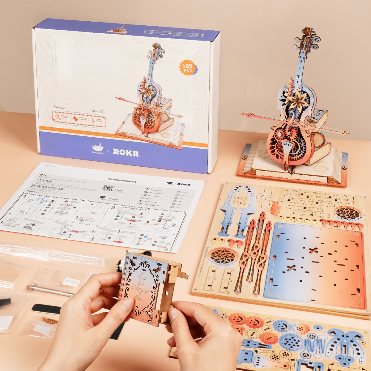 ROKR Symphony of Gorgeous Dreams AMK63M assembly scene with box and wooden sheets