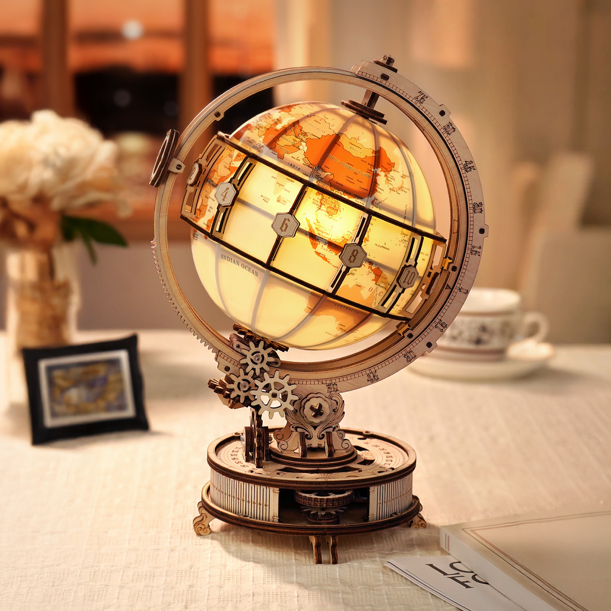 ROKR Luminous Globe glowing model displayed on warm desk