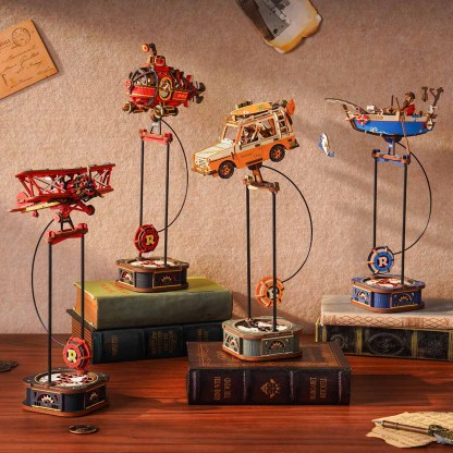 Collection de jouets d'équilibre à pendule ROKR Gravity Swing avec des modèles d'avion, de sous-marin et de véhicule.