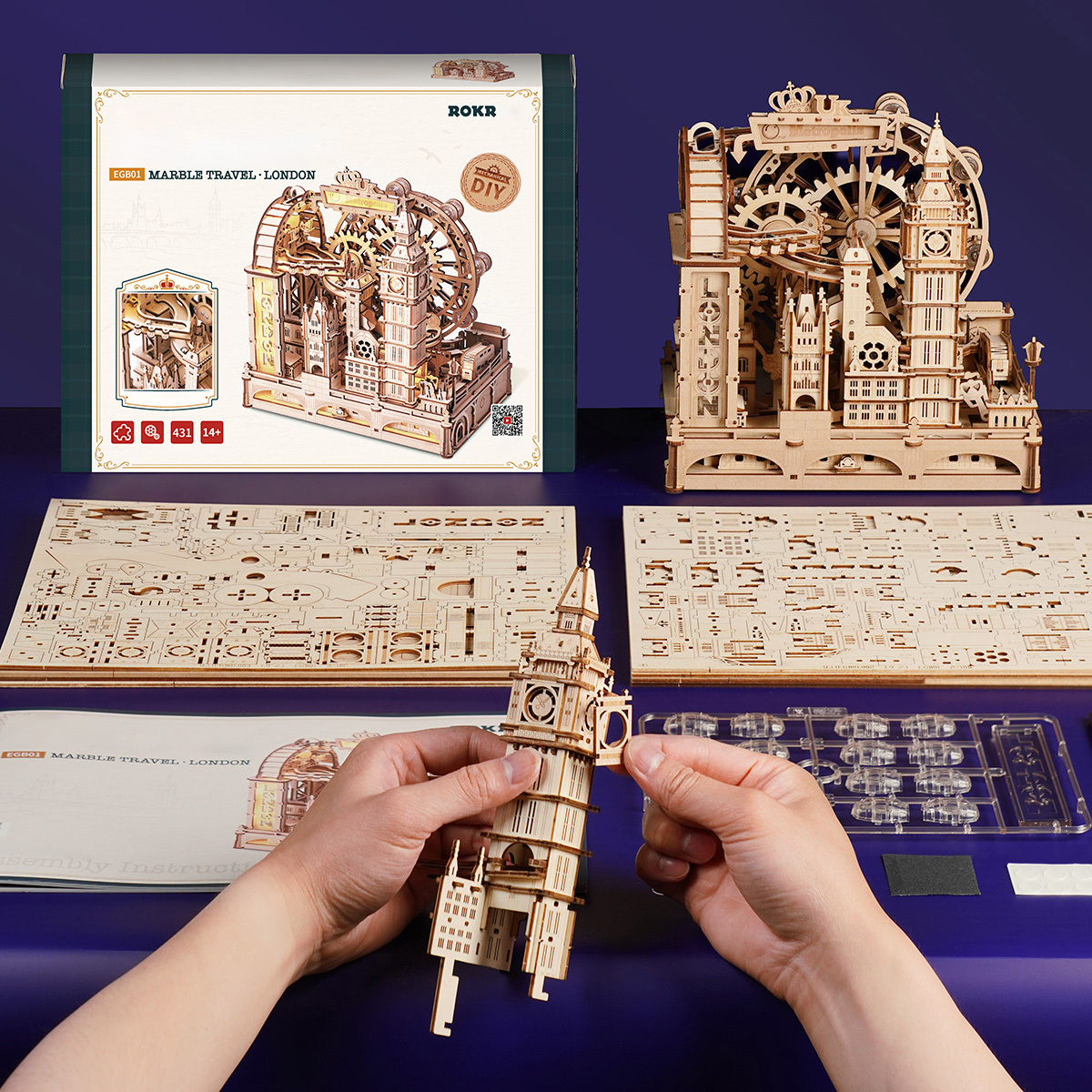 ROKR Marble Travel London EGB01 assembly scene with wooden parts and instruction book