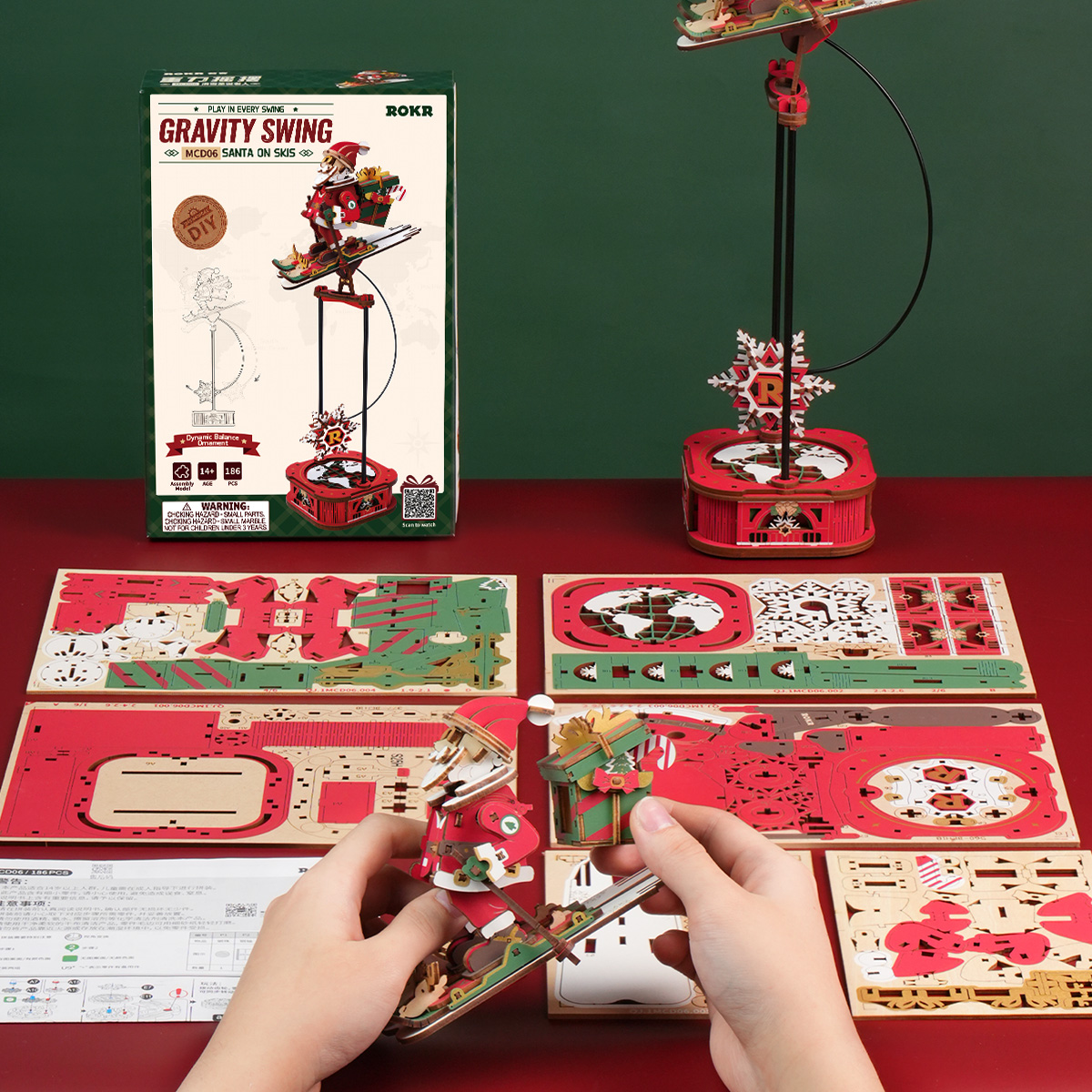 Santa on Skis assembly scene with wooden sheets and instructions
