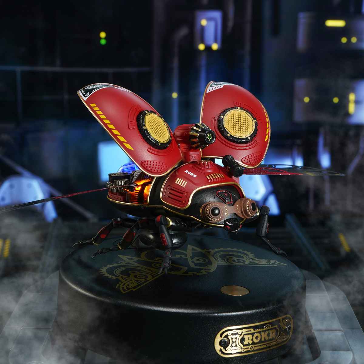 ROKR Scout Beetle MI02 red mechanical beetle on black display base