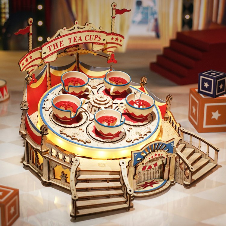 ROKR Tilt-A-Whirl EA04 tabletop carousel ride with red and blue canopy