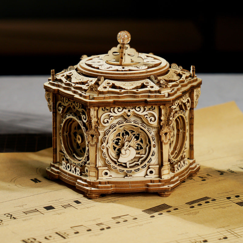 ROKR Secret Garden AMK52 wooden mechanical music box on parchment sheet