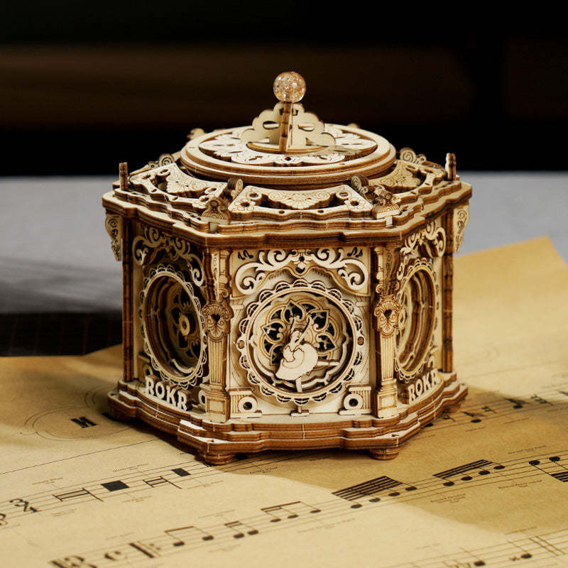 ROKR Secret Garden AMK52 wooden mechanical music box on parchment sheet