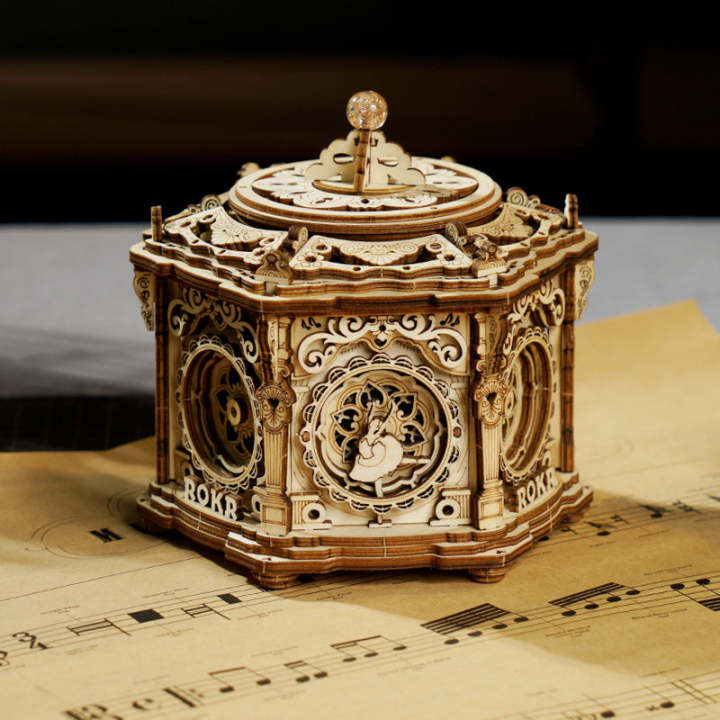 ROKR Secret Garden AMK52 wooden mechanical music box on parchment sheet