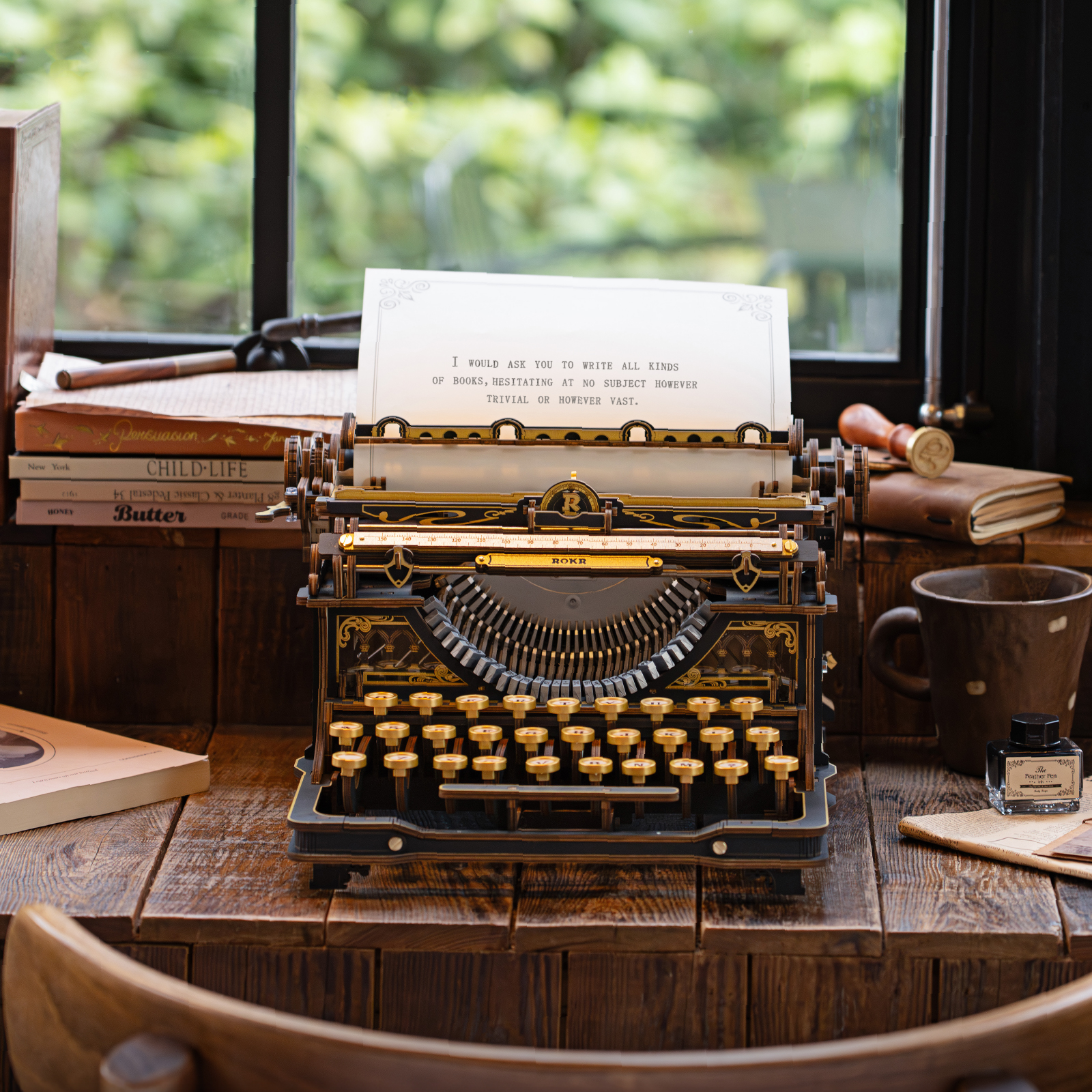 ROKR Mechanical Typewriter LK703B front view beside a window