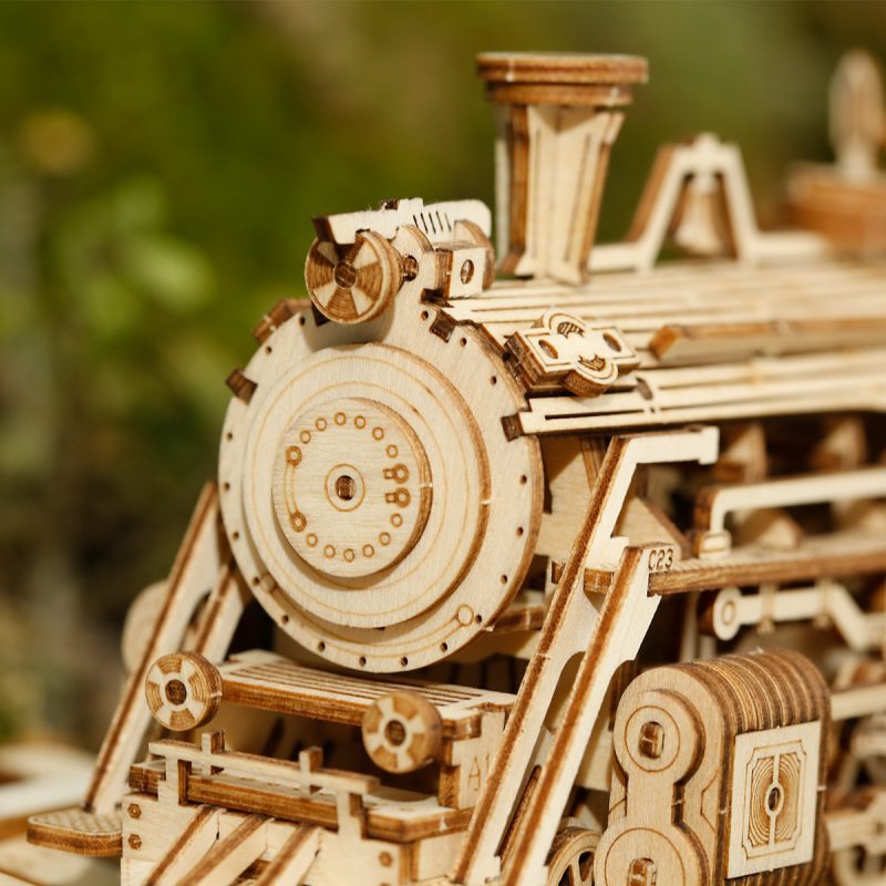 ROKR Prime Steam Express MC501 angled train model on railway tracks