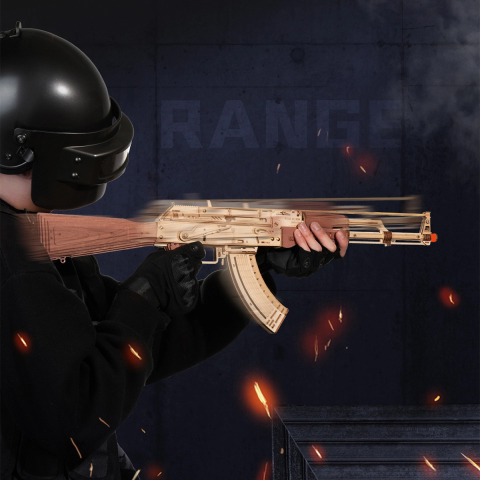 ROKR AK-47 LQ901 toy rifle hero shot held in a dark range scene