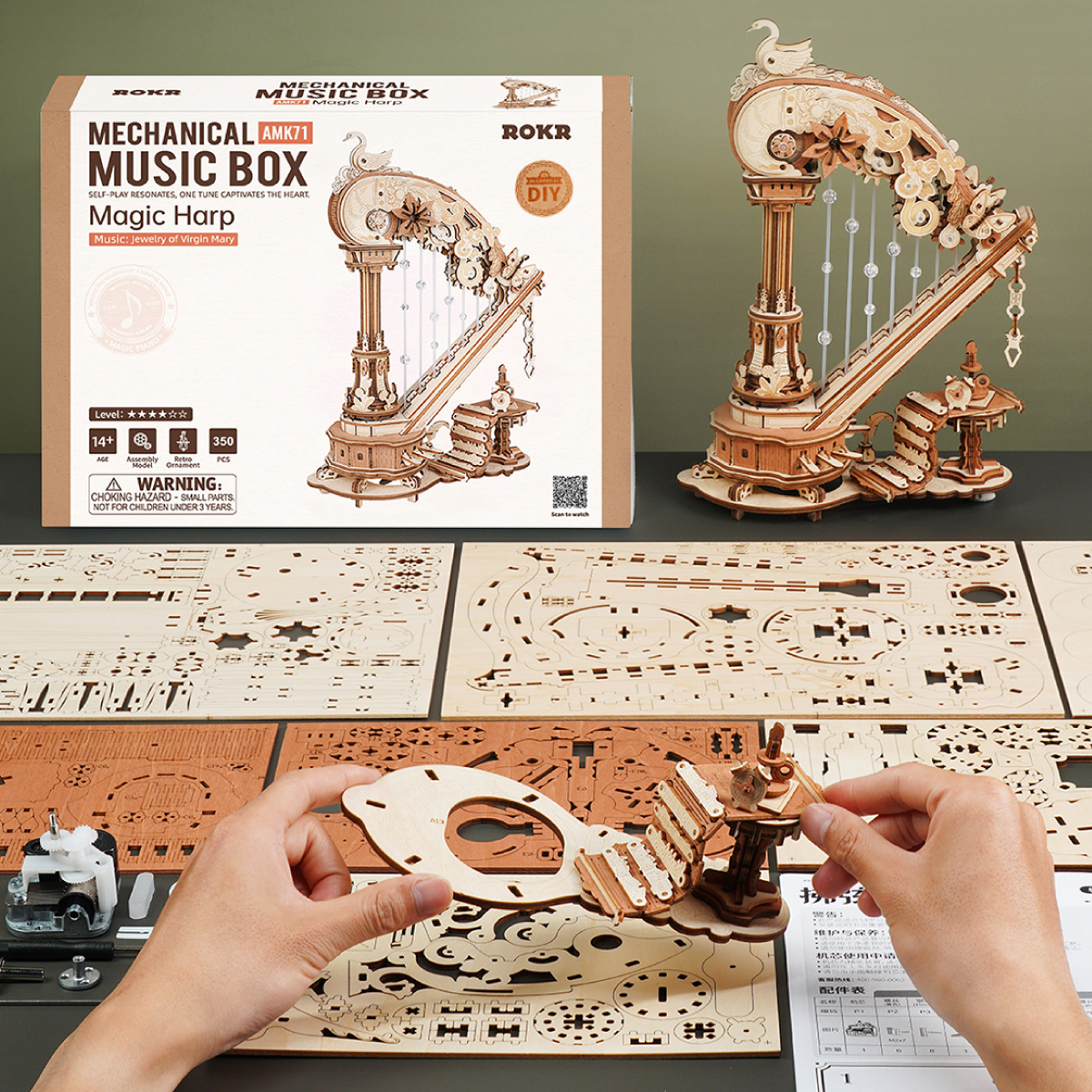 Magic Harp assembly scene with package, manual, wooden sheet, and parts