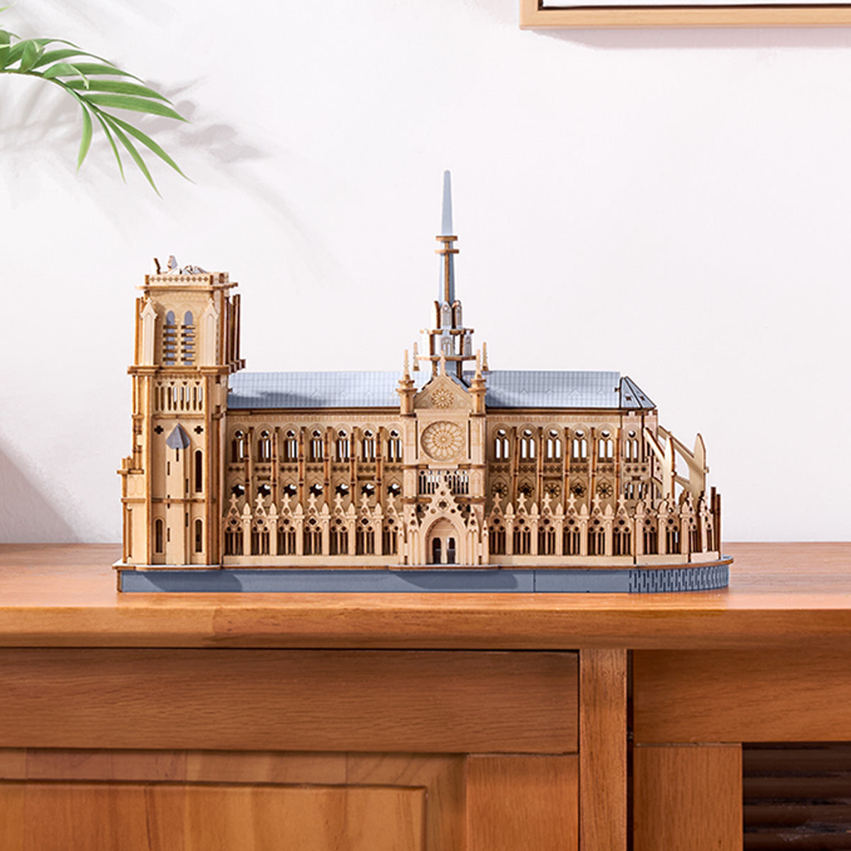 Paris Cathedral TG511 model displayed on shelf with plant decor