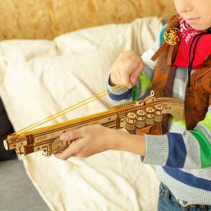 ROKR wooden gun model play scene with child holding long blaster