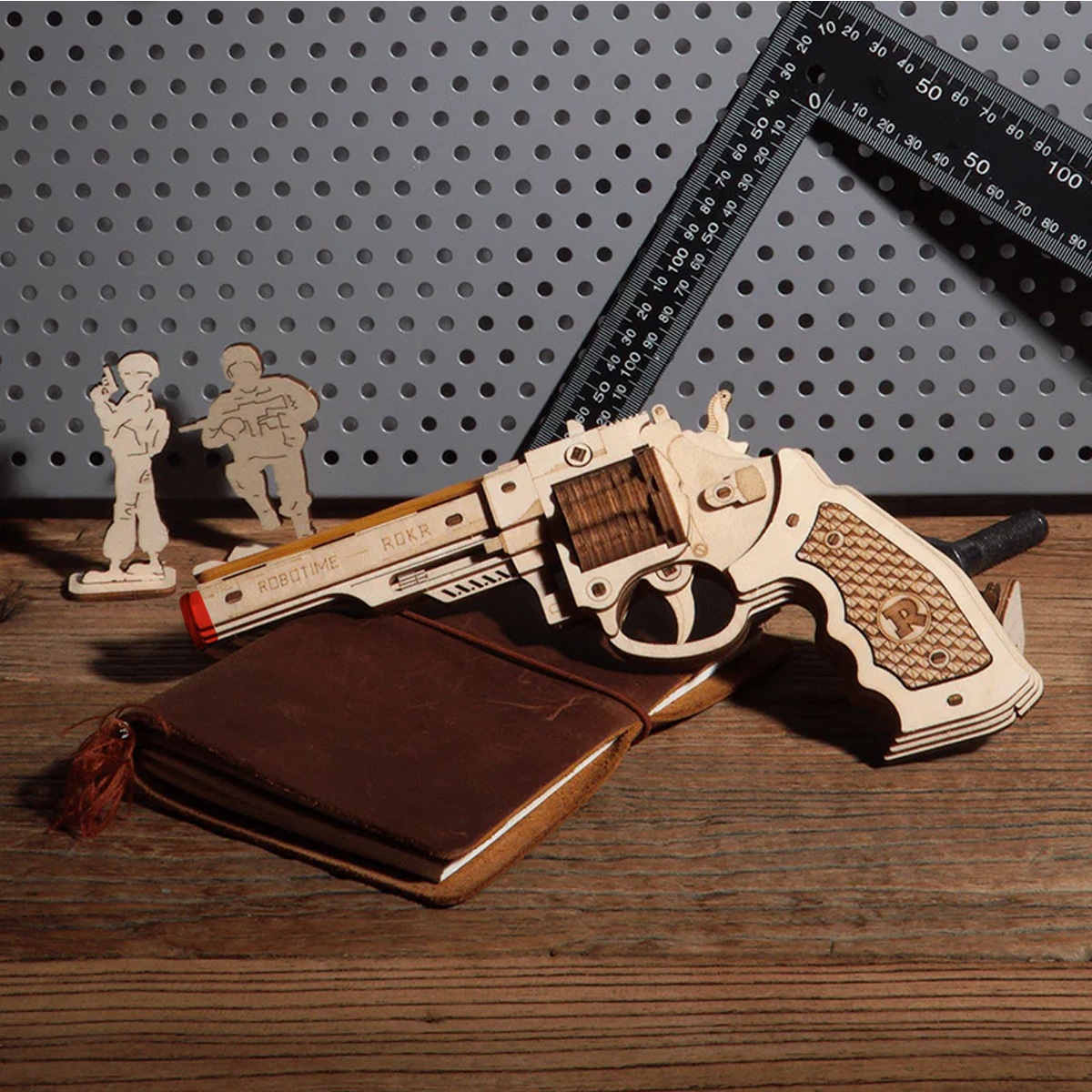 ROKR Corsac M60 Justice Guard wooden toy gun display on desk