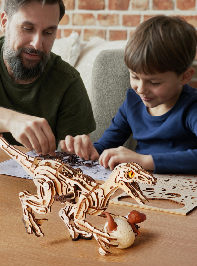 Family building a wooden dinosaur model